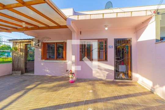 Fachada de casa à venda com 2 quartos, 58m² em Harmonia, Canoas