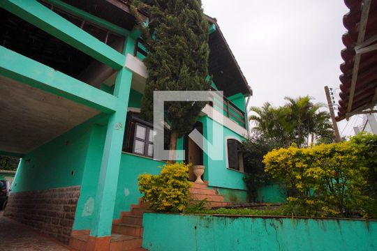 Fachada de casa para alugar com 5 quartos, 267m² em Jardim Sabará, Porto Alegre