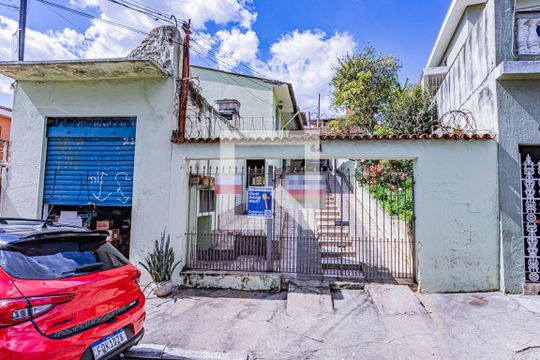 Fachada de casa à venda com 6 quartos, 450m² em Vila Portuguesa, São Paulo