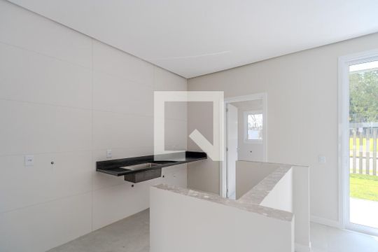 Cozinha de casa de condomínio à venda com 3 quartos, 144m² em Hípica, Porto Alegre