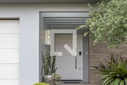 Fachada de casa de condomínio à venda com 3 quartos, 337m² em São José, São Leopoldo