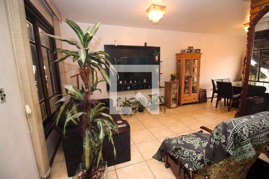 Sala de casa de condomínio à venda com 3 quartos, 175m² em Ipanema, Porto Alegre