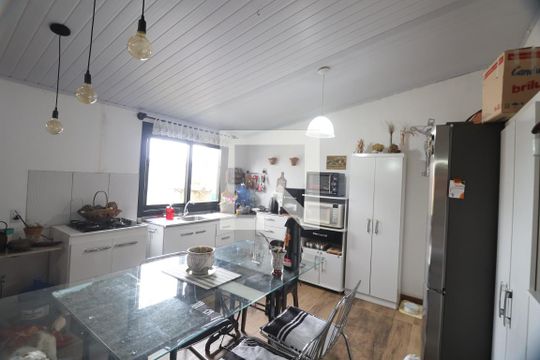 Sala/Cozinha de casa à venda com 3 quartos, 150m² em Guajuviras, Canoas