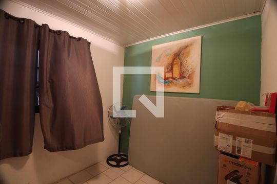 Quarto 1 de casa à venda com 3 quartos, 150m² em Guajuviras, Canoas