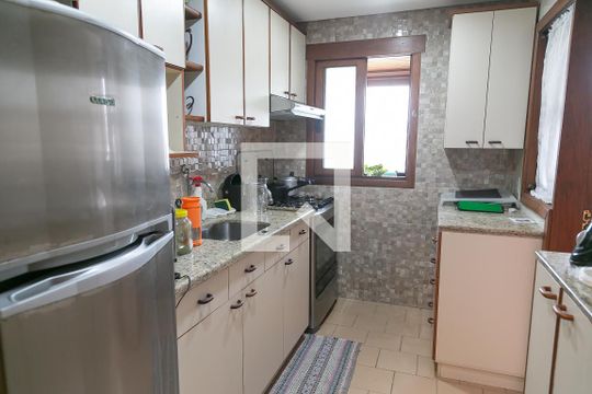 Cozinha de apartamento à venda com 2 quartos, 77m² em Rio Branco, Porto Alegre