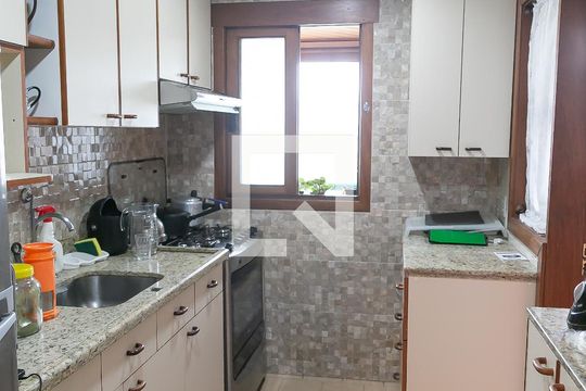 Cozinha de apartamento à venda com 2 quartos, 77m² em Rio Branco, Porto Alegre