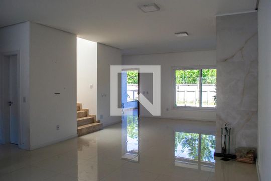 Sala de casa de condomínio à venda com 4 quartos, 240m² em Hípica, Porto Alegre