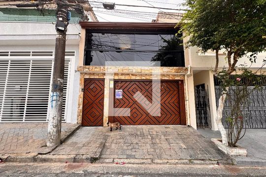 Fachada + plaquinha de casa à venda com 3 quartos, 267m² em Parque Gerassi, Santo André