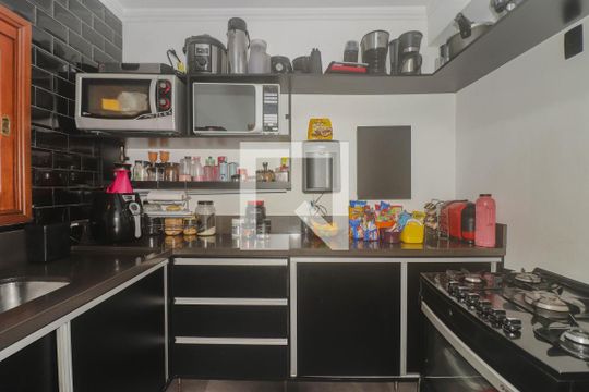 Cozinha e Área de Serviço de casa à venda com 3 quartos, 230m² em Morro Santana, Porto Alegre
