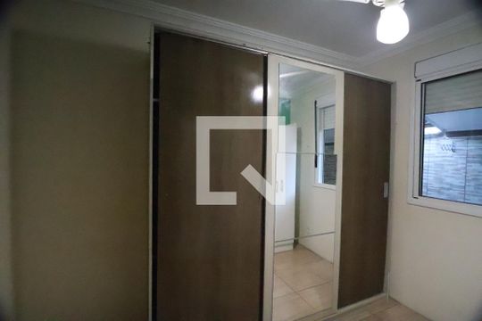 Quarto 1 de casa de condomínio à venda com 2 quartos, 80m² em Olaria, Canoas