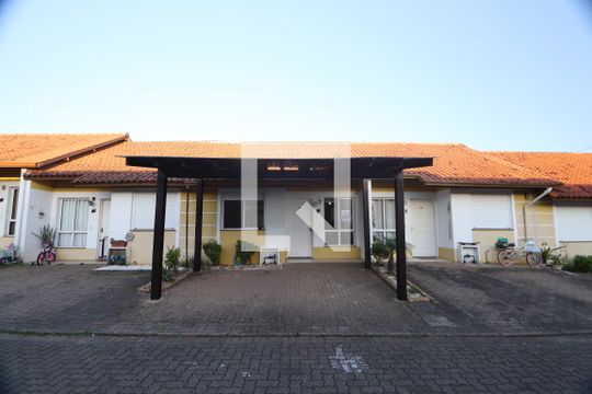 Fachada da casa de casa de condomínio à venda com 2 quartos, 80m² em Olaria, Canoas