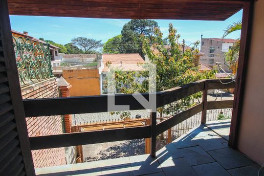 Sacada da Sala 2 de casa à venda com 3 quartos, 302m² em Partenon, Porto Alegre