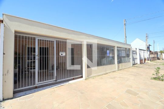Fachada de casa à venda com 2 quartos, 90m² em Harmonia, Canoas