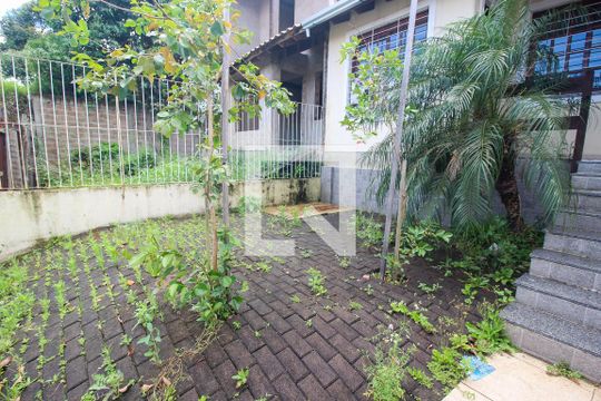 Garagem de casa à venda com 3 quartos, 117m² em Guarujá, Porto Alegre