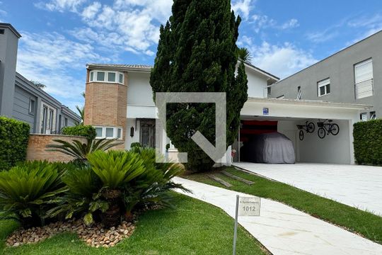 Fachada de casa de condomínio à venda com 3 quartos, 414m² em Alphaville Residencial Dois, Barueri