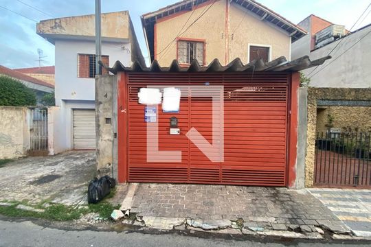 Fachada com plaquinha de casa à venda com 3 quartos, 108m² em Vila Nivi, São Paulo