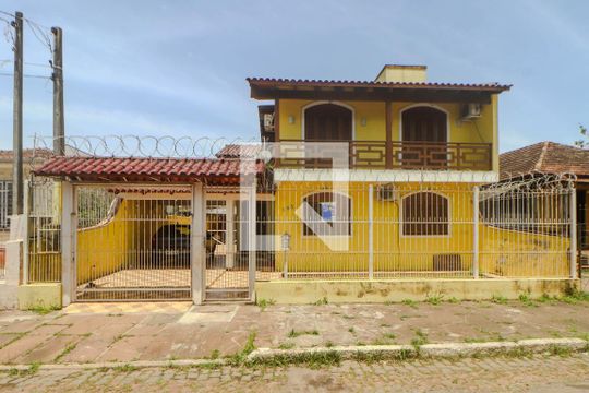 Fachada de casa à venda com 4 quartos, 490m² em Sarandi, Porto Alegre