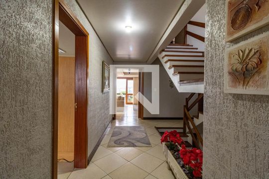 Hall de entrada de casa à venda com 4 quartos, 382m² em Campo Novo, Porto Alegre