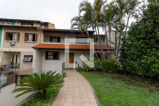 Fachada de casa à venda com 4 quartos, 382m² em Campo Novo, Porto Alegre