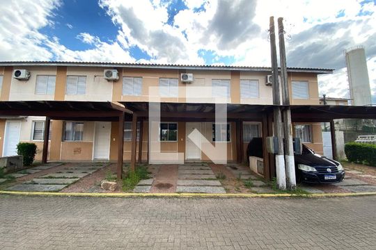 Fachada de casa de condomínio à venda com 3 quartos, 54m² em Canudos, Novo Hamburgo