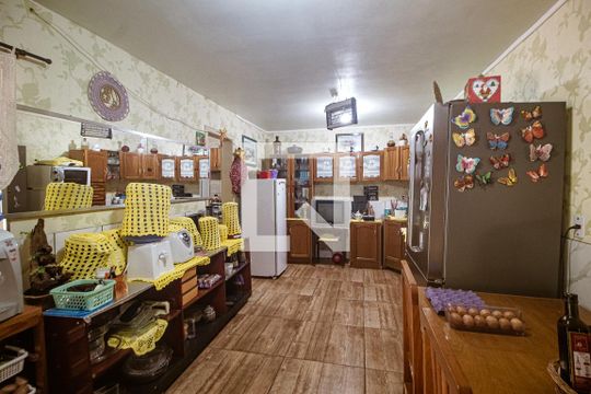 Cozinha de casa à venda com 4 quartos, 240m² em Campo Novo, Porto Alegre