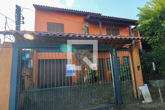 Fachada de casa à venda com 3 quartos, 149m² em Campo Novo, Porto Alegre