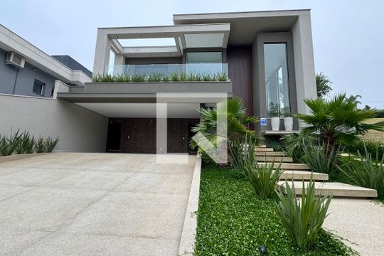 Fachada de casa de condomínio à venda com 4 quartos, 556m² em Colinas da Anhanguera, Santana de Parnaíba