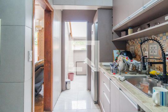 Cozinha e Área de Serviço de casa de condomínio à venda com 3 quartos, 100m² em Camaquã, Porto Alegre