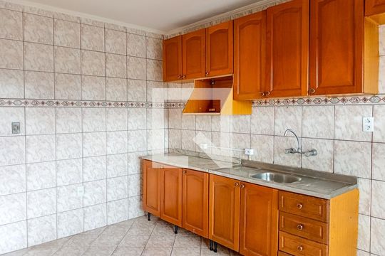 Cozinha de casa de condomínio à venda com 6 quartos, 250m² em Vila Nova, Porto Alegre