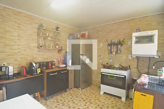 Cozinha de casa de condomínio à venda com 2 quartos, 80m² em Mato Grande, Canoas