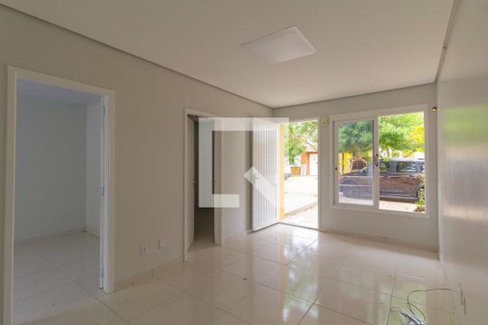 Sala de casa de condomínio para alugar com 2 quartos, 87m² em Rio Branco, Canoas