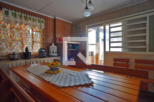 Cozinha e Churrasqueira de casa à venda com 4 quartos, 170m² em Parque Santa Fé, Porto Alegre