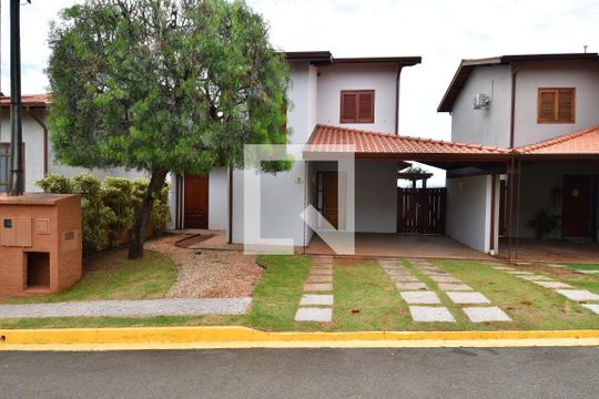 Fachada de casa de condomínio à venda com 3 quartos, 153m² em Parque dos Jacarandás, Campinas