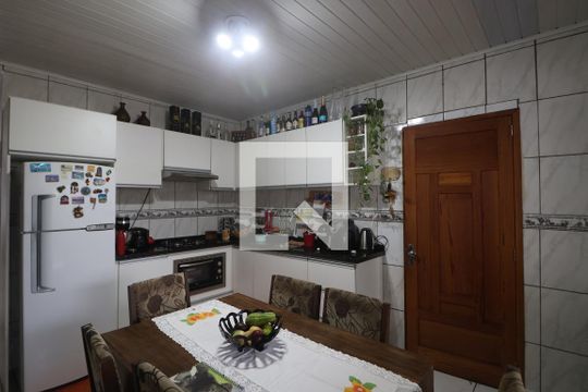 Cozinha - Armários de casa à venda com 3 quartos, 130m² em Estância Velha, Canoas