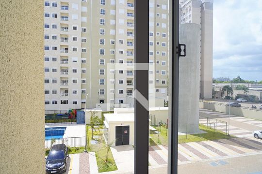 Quarto 1 - Vista de apartamento à venda com 2 quartos, 55m² em Humaitá, Porto Alegre