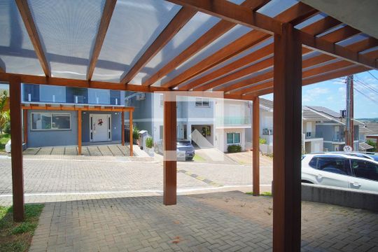 Garagem de casa de condomínio à venda com 3 quartos, 125m² em Rondônia, Novo Hamburgo