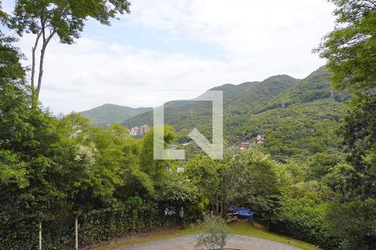 Sala - Vista de casa de condomínio para alugar com 4 quartos, 380m² em Lagoa da Conceição, Florianópolis
