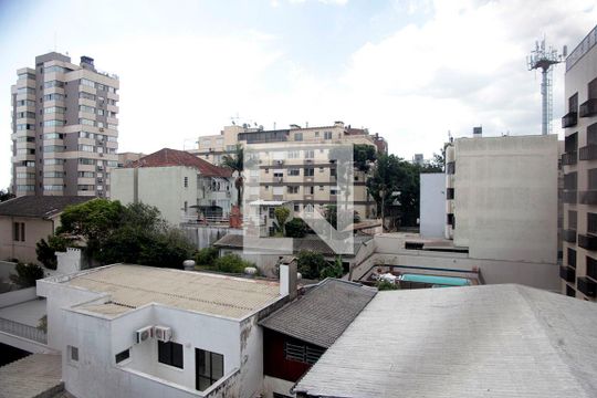 Cozinha + Área de Serviço Vista de apartamento para alugar com 1 quarto, 60m² em Auxiliadora, Porto Alegre