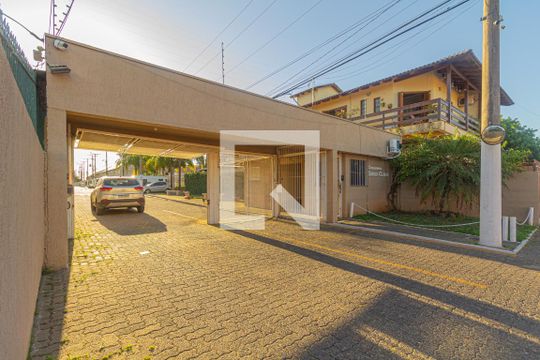 Fachada de casa de condomínio à venda com 2 quartos, 65m² em Rio Branco, Canoas