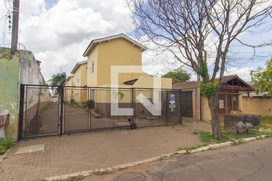 Fachada de casa de condomínio à venda com 2 quartos, 126m² em Fátima, Canoas