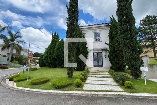 Fachada de casa de condomínio à venda com 4 quartos, 614m² em Residencial Morada dos Lagos, Barueri
