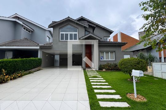 Fachada de casa de condomínio à venda com 5 quartos, 360m² em Alphaville, Santana de Parnaíba