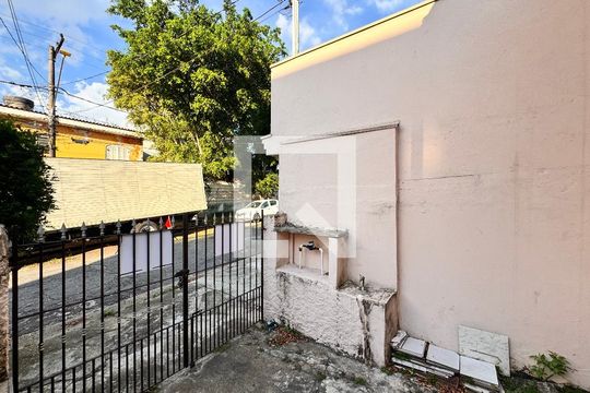 Garagem + hall de entrada de casa à venda com 3 quartos, 95m² em Utinga, Santo André