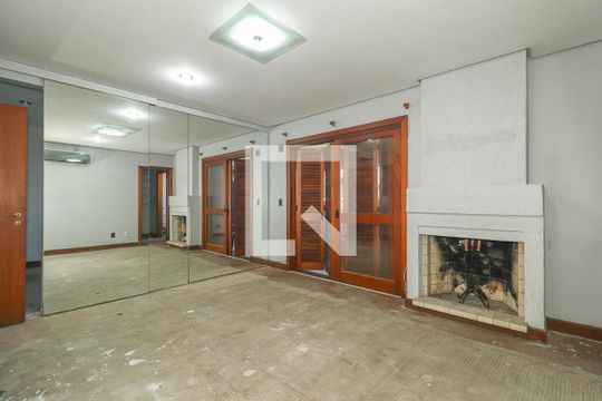 Quarto Suíte de casa de condomínio à venda com 5 quartos, 500m² em Três Figueiras, Porto Alegre