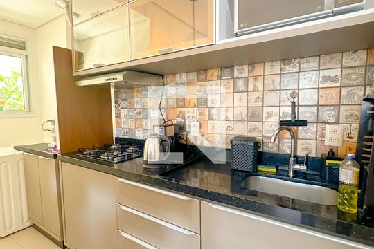 Cozinha de apartamento para alugar com 2 quartos, 85m² em Canasvieiras, Florianópolis