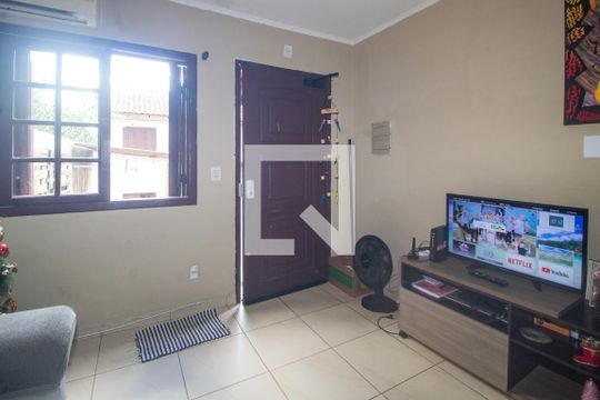 Sala de casa de condomínio à venda com 3 quartos, 90080m² em Vila Nova, Porto Alegre