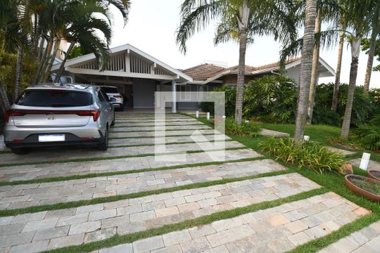 Garagem de casa de condomínio para alugar com 4 quartos, 398m² em Vila Hollândia, Campinas