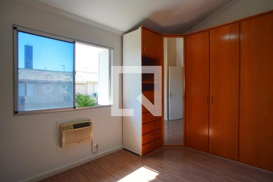 Quarto 2 - Segundo Andar de casa de condomínio à venda com 3 quartos, 87m² em Humaitá, Porto Alegre