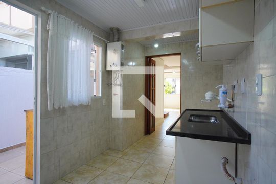 Cozinha de casa de condomínio à venda com 3 quartos, 87m² em Humaitá, Porto Alegre
