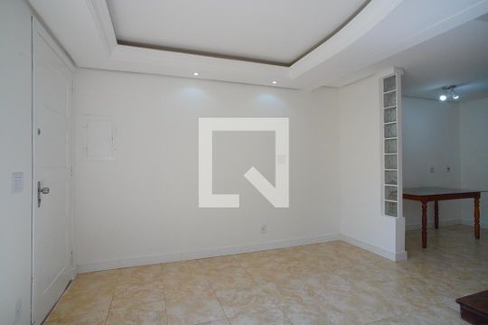 Sala de casa de condomínio à venda com 3 quartos, 87m² em Humaitá, Porto Alegre